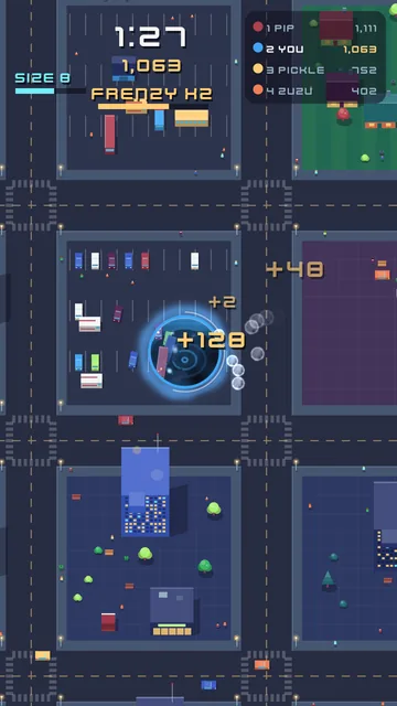 A Feeding Frenzy pulling cars into the glowing hole